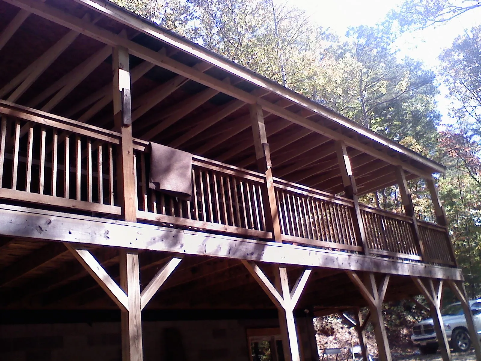 Timber framing under a new elevated porch and deck — Roof Leak Repair in Williamsfield by Roofing Brothers